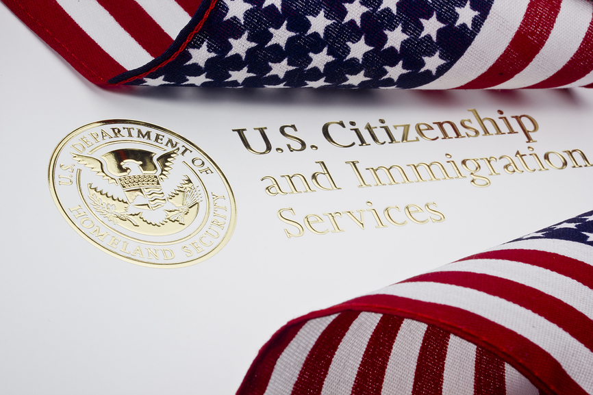 U.S. Citizenship & Immigration Logo & U.S. flag