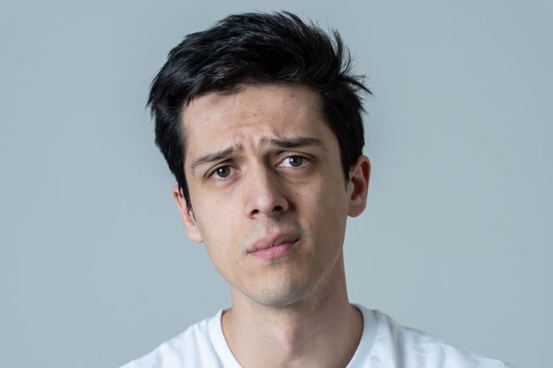 serious young hispanic man