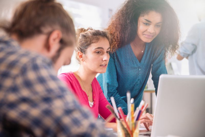 Multiethnic employees working together in office